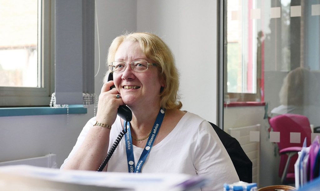 Our experienced Benefits and Money Advisor providing advice over the phone to someone affected by a brain tumour
