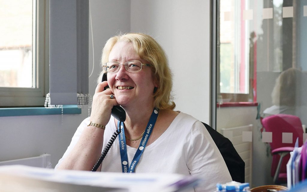 Our experienced Benefits and Money Advisor providing advice over the phone to someone affected by a brain tumour
