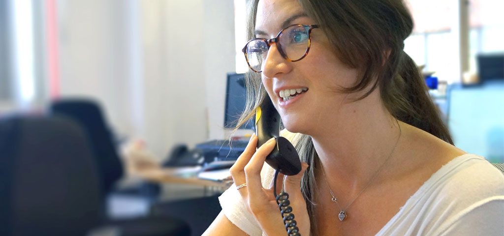 A member of our Support & Information Team provides support over the phone to somebody affected by a brain tumour diagnosis.